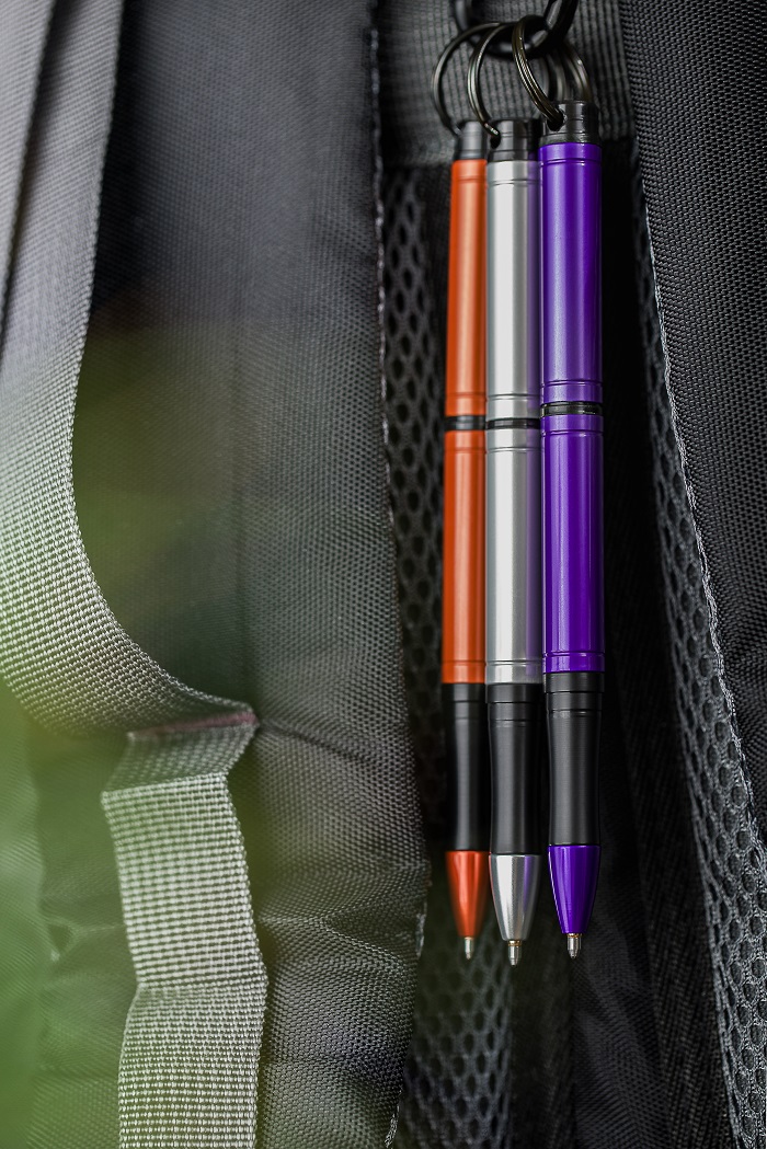 Orange, Grey, and Purple Backpackers hanging from loop